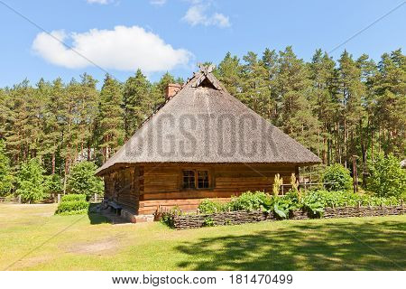 RIGA LATVIA - JUNE 13 2016: Dwelling rural house (circa 1848) of Veskerves farmstead of Kurzeme ethnic group. Exhibited in Ethnographic Open-Air Museum of Latvia since 2001