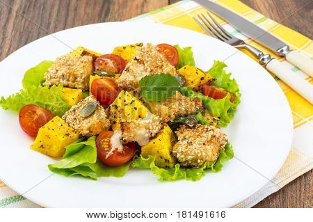Warm grilled sulguni with vegetables. Studio Photo