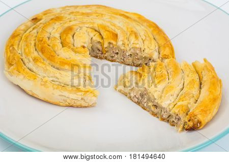 Burek with meat. Turkish baked goods. Studio Photo