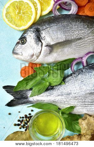 Uncooked Organic Dorado Or Sea Bream With Ingrediets For Making.top View .