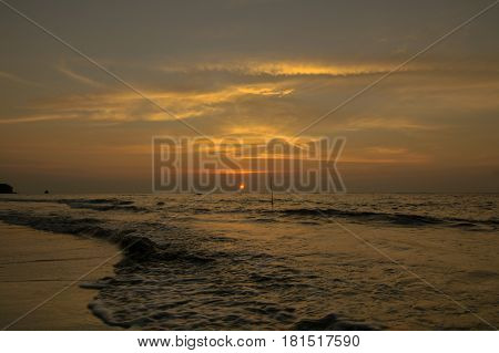 Tropical sunset on the Pancur Hitam Beach. Located at Federal Territory of Labuan, Borneo, Malaysia.