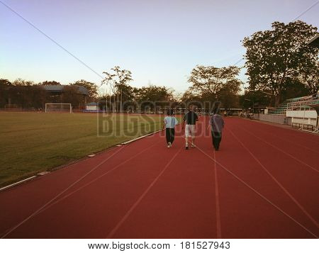 SALAYA, NAKHONPHATHOM, THAILAND-April 12, 2017. Elderly person are walking for exercise in racetrack.