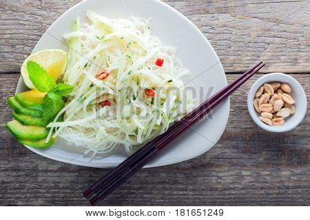 Spicy kohlrabi noodles, dressing: fish sauce, vinegar rices, lime garlic and ginger