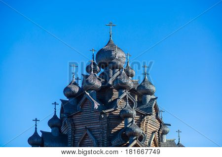 Beautiful summer vibrant picture of old russian wooden orthodox church exterior