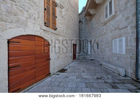 KORCULA, CROATIA - NOVEMBER 09: Narrow street in the old town of Korcula, Dalmatia, Croatia on November 09, 2016.