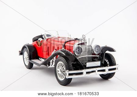 Mercedes Benz 1900s red classic car isolated in white background