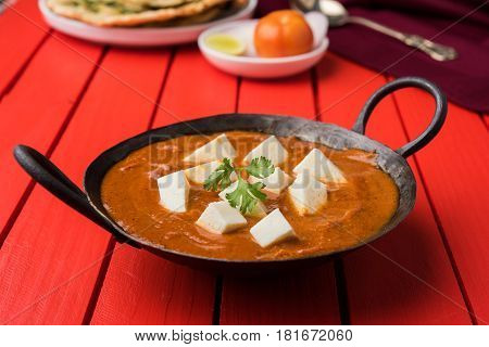 paneer butter masala or cheese cottage curry, popular indian lunch/dinner menu in weddings or parties, selective focus