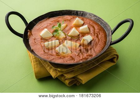 paneer butter masala or cheese cottage curry, popular indian lunch/dinner menu in weddings or parties, selective focus