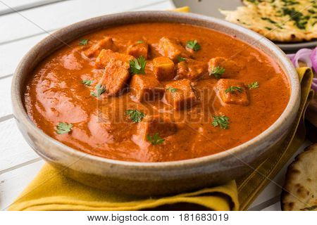 paneer butter masala or cheese cottage curry, popular indian lunch/dinner menu in weddings or parties, selective focus