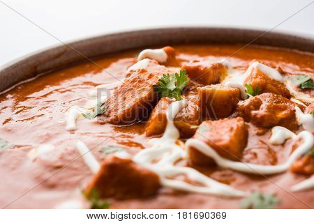 paneer butter masala or cheese cottage curry, popular indian lunch/dinner menu in weddings or parties, selective focus