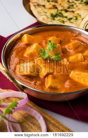 paneer butter masala or cheese cottage curry, popular indian lunch/dinner menu in weddings or parties, selective focus