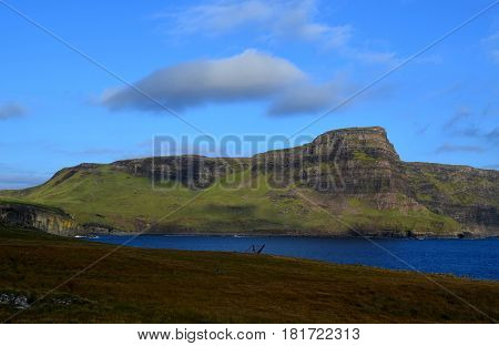 Gorgeous rolling hills and towering sea cliffs on the Isle of Skye.