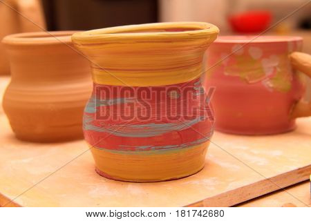 Cay pot painted, pottery craft, moulding the pot with your hands, sculpting hands