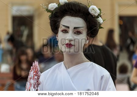 TIMISOARA ROMANIA - March 31 2017: Geisha woman in traditional japanese kimono at the CheckArt Carnaval