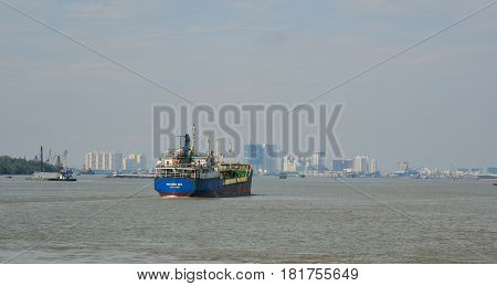 Cargo Ships On The Saigon River In Southern Vietnam