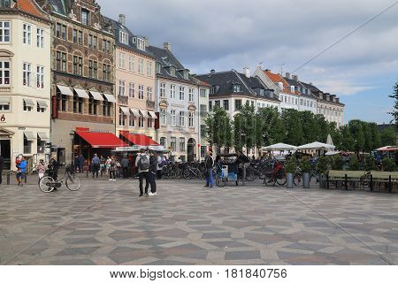 COPENHAGEN, DENMARK - JUNE 29, 2016: This is part of the pedestrian area of Stroget which is called Amagertorv Square.