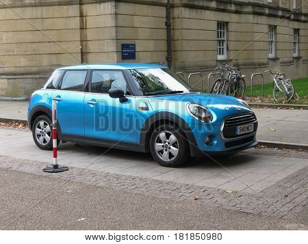Light Blue Mini Cooper Car In Oxford