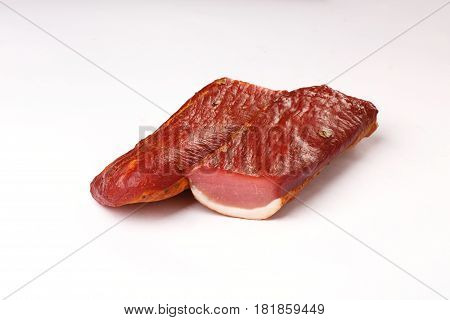 balyk on a white background. dried meat. beef, pork