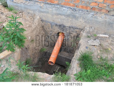 Build over sewer pipe. Foundation over sewer pipe drainage system.