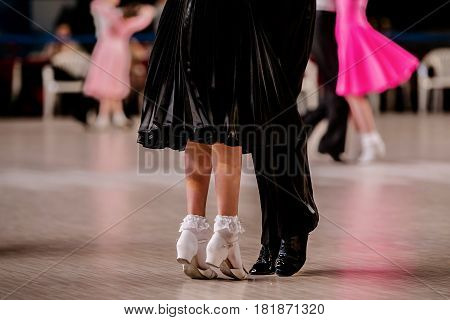 pair children athletes dancers on her toes dance flooring