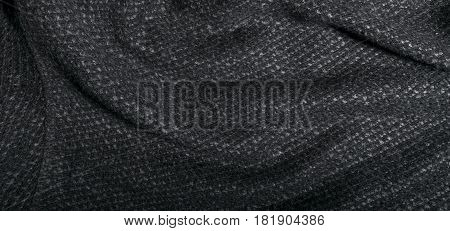 Rough cotton dark gray fabric background for fashion designers
