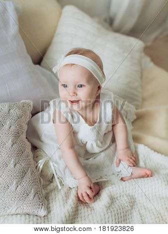 Young happy and beautiful mother with baby