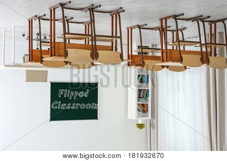 Flipped classroom concept. Inversed interior of school room