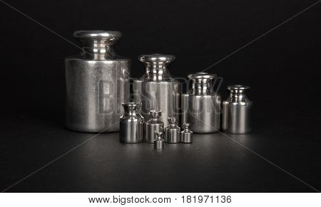 Steel Weight set as teamwork concept on black background