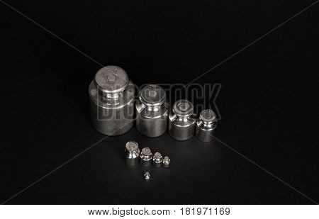 Steel Weight set as teamwork concept on black background