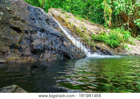 Sarika Waterfall, Khao Yai National Park - Nakhon Nayok Province, Thailand. Green Water In Foregroun