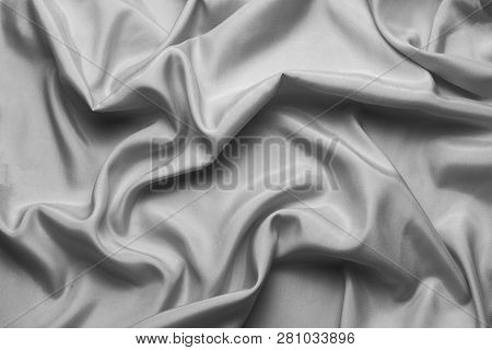 Smooth Silk Fabric Or Statin Gray With Waves, Can Be Used As Background Or Wallpaper