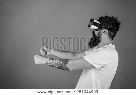 Hipster On Concentrated Face Driving Car On High Speed In Virtual Reality. Man With Beard In Vr Glas