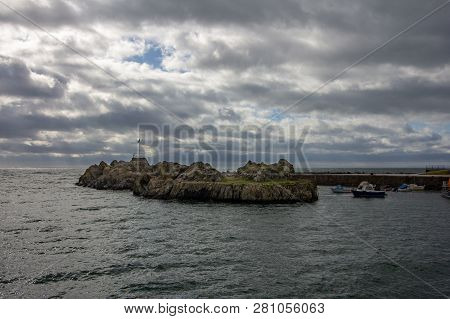 Portpatrick Harbor On An Overcast Day In Scotland, United Kingdom