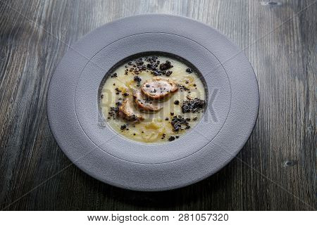 Delicious Cream Soup Decorated With Homemade Sausage