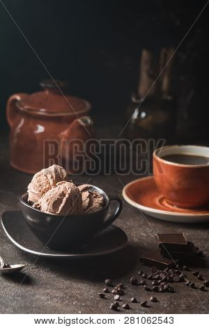 Chocolate Coffee Ice Cream Balls In A Bowl Over Dark Background