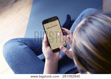 Corby, United Kingdom - January 27, 2019: Women Hand Holding Smartphone With Instagram Application O