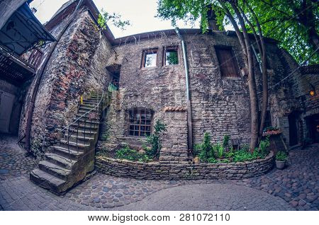 Estonia, Tallinn - May 17, 2016: Old Town Street. Distortion Perspective Fisheye Lens