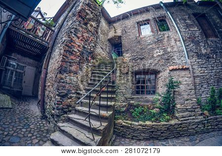 Estonia, Tallinn - May 17, 2016: Old Town Street. Distortion Perspective Fisheye Lens