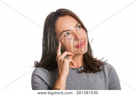 Closeup Portrait Of A Beautiful Young Woman Thinking Or Having An Idea Isolated On White Background.