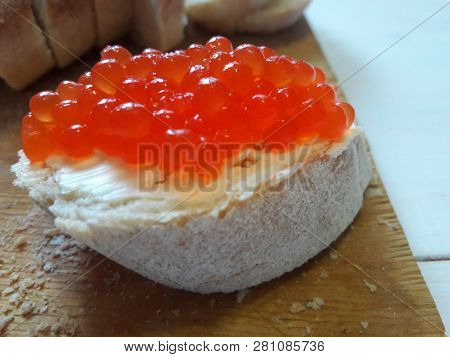 Bread Is Black. White, In Slices. Narzen Bread. On A Tree A Tree. On The Table. For Background. For 