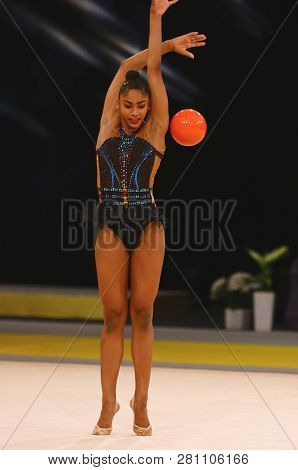 Kyiv, Ukraine - March 18, 2017: Rhythmic Gymnast Nastasya Generalova Of Usa Performs With Ball Durin