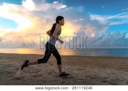 Asian Girl Run On The Beach, This Immage Can Use For Sport, Lifestyle, Slim, Run And Jogging Concept