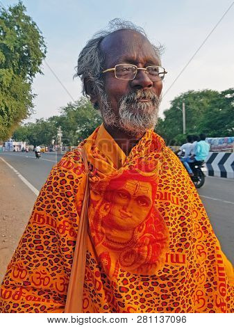 Tiruvanamalai, India - January 5, 2019: Indian sadhu in the streets from Tiruvanamalai in India