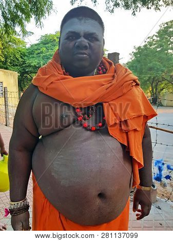 Tiruvanamalai, India - January 5, 2019: Indian sadhu in the streets from Tiruvanamalai in India