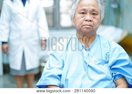 Doctor Help And Care Asian Senior Or Elderly Old Lady Woman Patient Sitting On Wheelchair At Nursing
