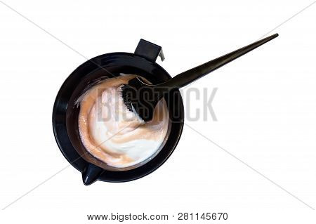 Mixing Hair Dye In A Special Plastic Bowl. Concept Is Hair Coloring. Isolated On White.