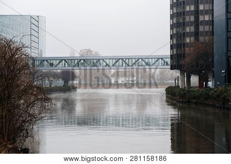 European Parliament Connection Bridge Passarela Over The Ill River On A Misty Morning Winter Day Wit