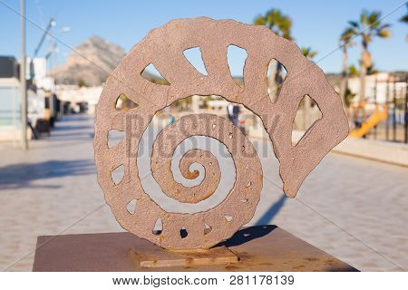 Sculpture And Decor Concept - Concrete Form Of The Spiral Shape Of A Shell