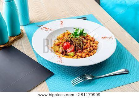 Vegetarian Dish Served In Chickpea Restaurant And Vegetables