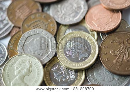 Close Up Of Fractional Currency Coins Of Pound Sterling Such As Ten Pence And One Pound . Saving And